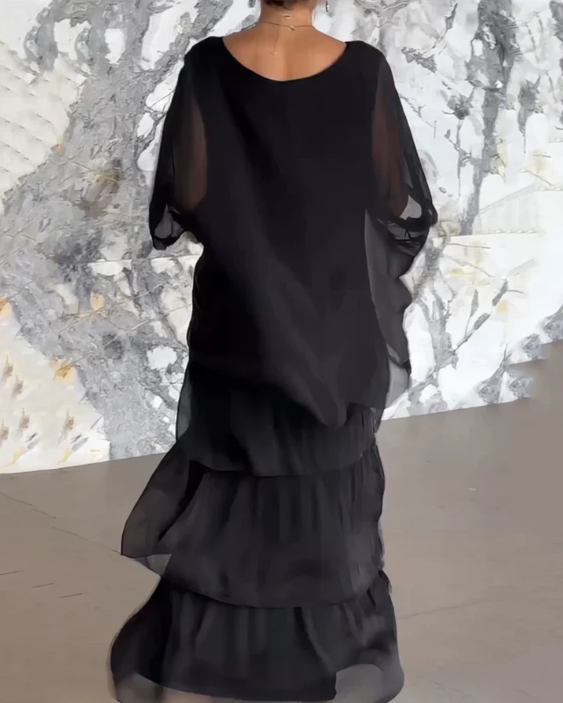 Shina – elegantti laskeutuva maksimekko